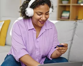 women purchasing something online with her card