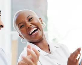 Group of happy employees clapping