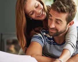 Man and woman checking their finances