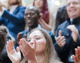 Group of people clapping