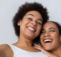 women smiling and happy