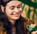 Lady happy with her plants
