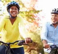 Man and woman riding on a bike