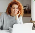 woman sitting at desk working from home
