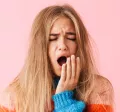 young lady yawning