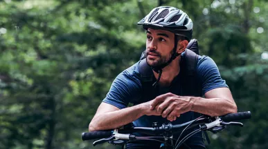 Man riding bike in the woods
