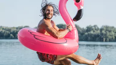 man jumping to water