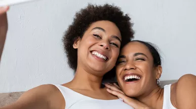 women smiling and happy