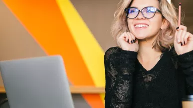 Happy employee smiling at work