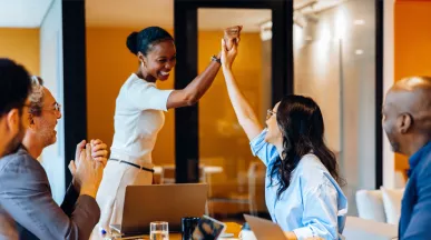 Group of colleagues celebrating each other
