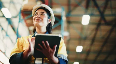 woman with clipboard in warehouse