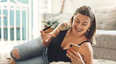 Woman shopping online via her phone