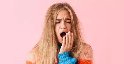 young lady yawning