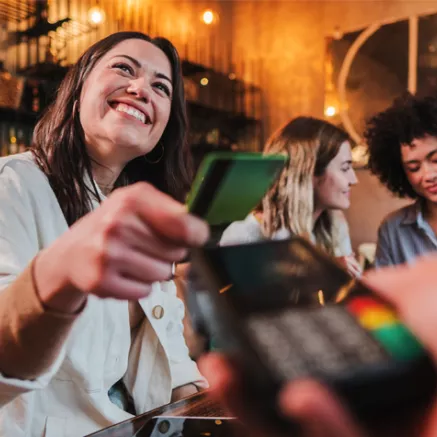 paying for a meal with a card